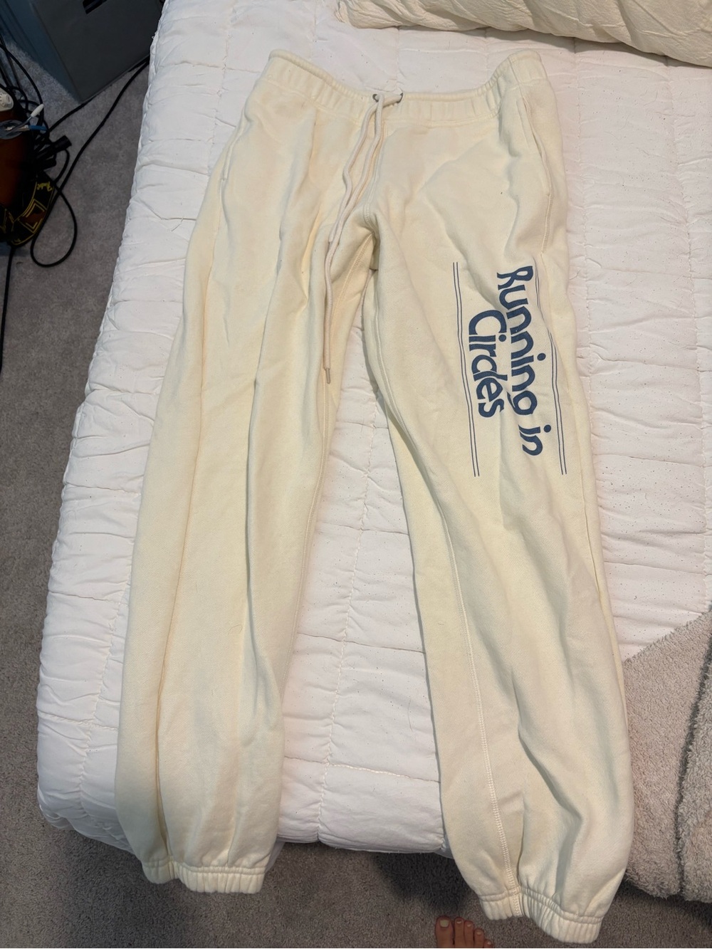 Urban Outfitters Cream Sweatpants with Navy Graphic